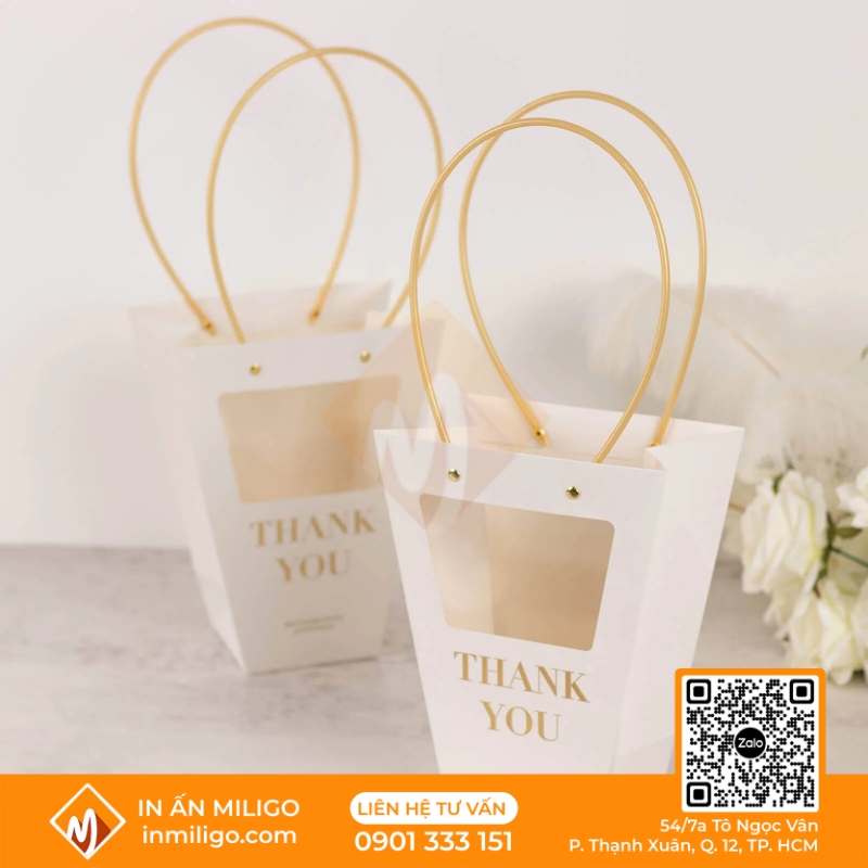 túi giấy nặt kính